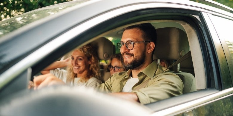 Happy Drivers in their new car